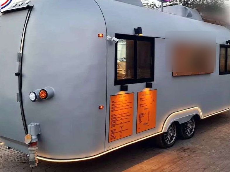Polished aluminum burger trailer